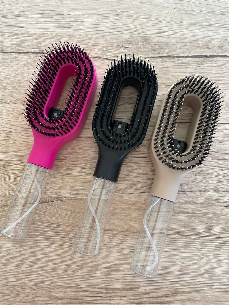 Brosse 2-en-1 avec spray intégré
